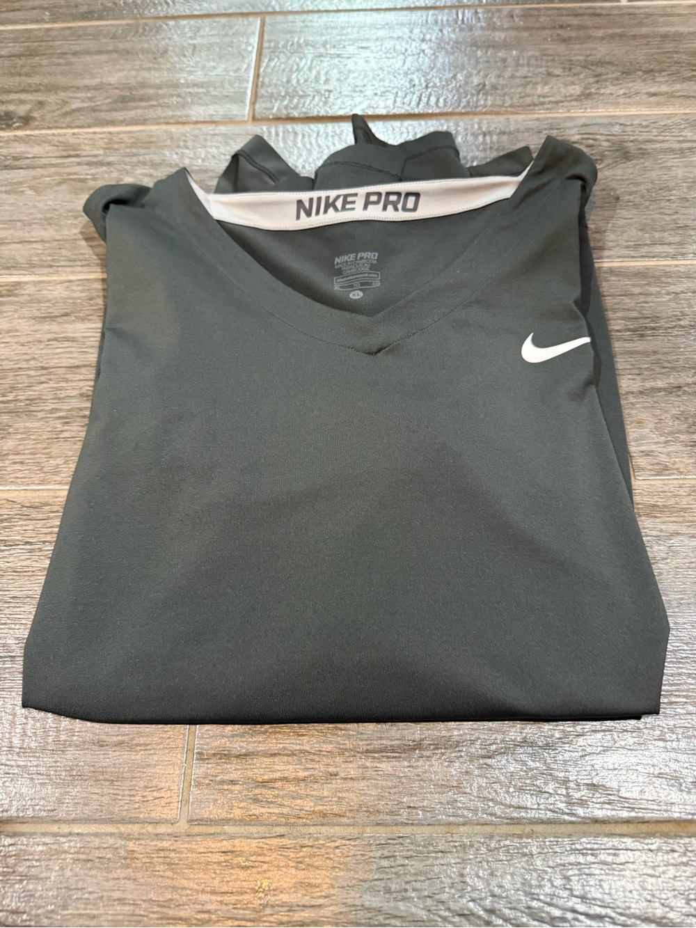Womens Nike Dri Fit long sleeve black top with finger holes